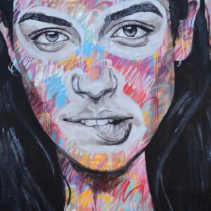 woman with black hair painting